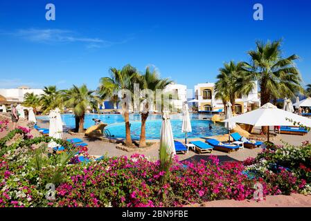 SHARM EL SHEIKH, EGYPT -  DECEMBER 1: The tourists are on vacation at popular hotel on December 1, 2012 in Sharm el Sheikh, Egypt. Up to 12 million to Stock Photo