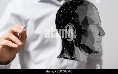 A head with symbol neurons in brain Stock Photo