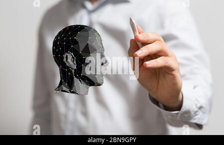 A head with symbol neurons in brain Stock Photo