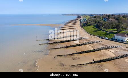 An aerial view of an empty sandy beach. Pandemic quarantine. Whitstable, Kent, UK Stock Photo