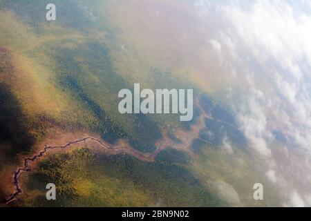 Aerial of the Abitibi River, muskeg and boreal forest in autumn, south of the Cree Nation town of Moosonee, in Northern Ontario, Canada. Stock Photo