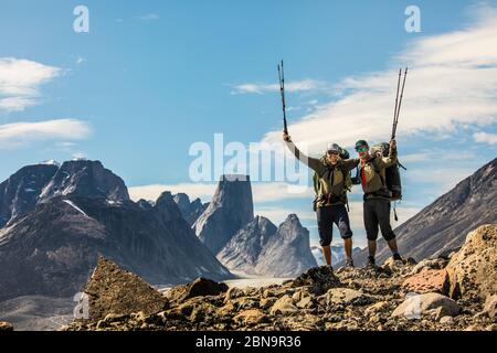 Portrait of two backpackers on mountain ridge in Akshayak Pass, Stock Photo