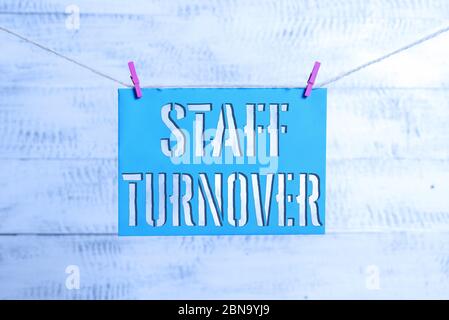 Handwriting text Staff Turnover. Conceptual photo The percentage of workers that replaced by new employees Clothesline clothespin rectangle shaped pap Stock Photo