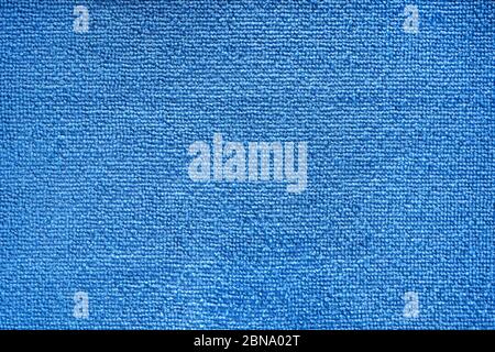 Microfiber towel blue terry texture swatch. Micro fiber material cloth with close up shot. Fabric texture background. Fabric blue pattern. Cleaning se Stock Photo