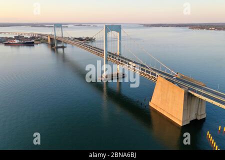 Aerial view of the Throgs Neck Bridge connecting the Bronx with Queens in New York City at sunset. Stock Photo