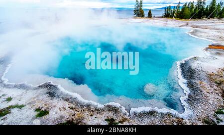 The turquoise colored of the Back Pool in the West Thumb Geyser Basin in Yellowstone National Park, Wyoming, United States Stock Photo