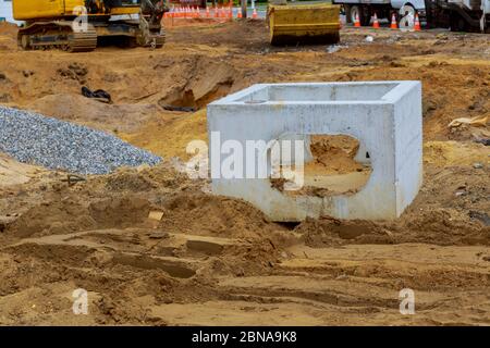 Construction for protection flood huge block concrete main sewage for draining and carry water under the street. Stock Photo