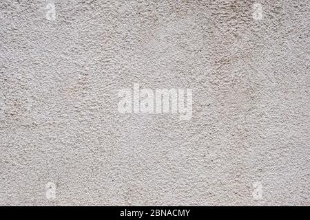 Wall plaster background texture. White color rough material. Exterior building facade Stock Photo