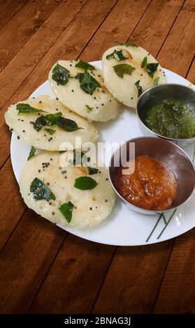 Idli & Sambar on White Plate, South Indian Breakfast Stock Photo