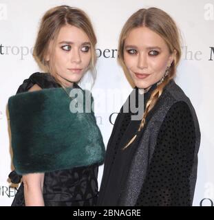 Manhattan, United States Of America. 24th Mar, 2011. NEW YORK, NY - MARCH 24: Ashley Olsen Mary-Kate Olsen at the Metropolitan Opera's gala premiere of Rossini's 'Le Comte Ory' at The Metropolitan Opera House on March 24, 2011 in New York City People: Ashley Olsen Mary-Kate Olsen Credit: Storms Media Group/Alamy Live News Stock Photo