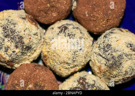 Delicious handmade Bonbon chocolate, assortment of delicious decorative round candies, close-up Stock Photo