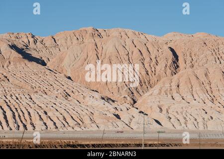 Barren mountains on rocky desert landscape Stock Photo
