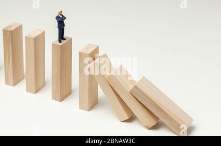 Crisis Manager. Stop the fall of the company. The cessation of the domino effect Stock Photo