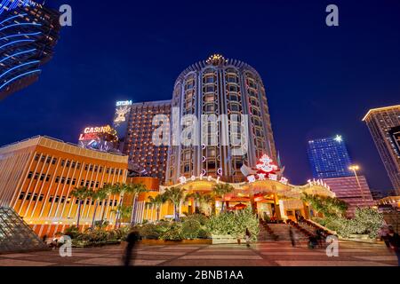 Hotel Lisboa illuminated at night. Macau, China. Stock Photo