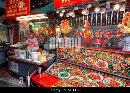 Traditional Asian food stall in Singapore Food Trail hawker center, Singapore. Stock Photo