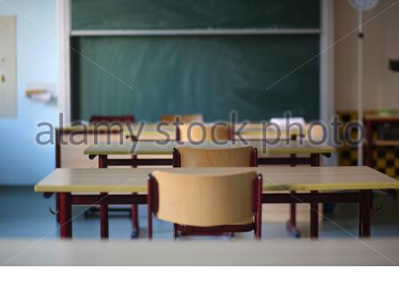 A deserted school classroom in Germany as the Corona lockdown still means that many students remain at home. Stock Photo