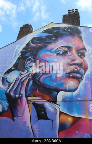 Street Art Psychedelic Strong woman by Mr Cenz Stock Photo