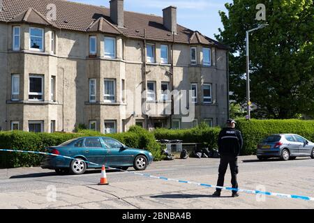 Edinburgh, Scotland, UK. 14 May 2020. Police and forensic team attend a crime scene at address in Restalrig area of Edinburgh following a serious assault at a property in Hawkhill Avenue in the east of the city. The  incident happened around 10.30pm on Wednesday, 13 May, 2020 and a 27-year-old man was taken to Edinburgh Royal Infirmary for treatment for his injuries.  Iain Masterton/Alamy Live News Stock Photo