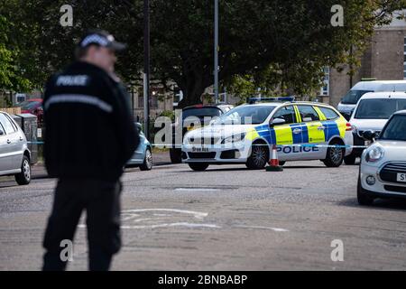 Edinburgh, Scotland, UK. 14 May 2020. Police and forensic team attend a crime scene at address in Restalrig area of Edinburgh following a serious assault at a property in Hawkhill Avenue in the east of the city. The  incident happened around 10.30pm on Wednesday, 13 May, 2020 and a 27-year-old man was taken to Edinburgh Royal Infirmary for treatment for his injuries.  Iain Masterton/Alamy Live News Stock Photo