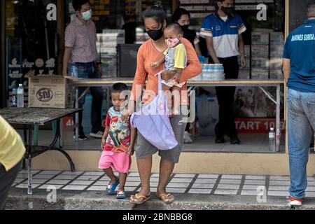 Covid-19 Food.  Free food handout to people in need due to loss of income from Coronavirus funded by local businesses in Pattaya Thailand Asia Stock Photo