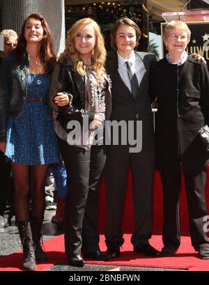 13 May 2020 - Beckett Cypher, Melissa Etheridge's son with her former partner Julie Cypher, has died of causes related to opioid addiction, at age 21. Cypher was born to Melissa Etheridge and filmmaker Julie Cypher in November 1998. The couple had another child, a daughter, Bailey Jean, 23, who was born in February 1997. The sperm for the Beckett and Bailey Jean Cypheridge was donated by music legend David Crosby. Cypher and Melissa Etheridge split in September 2000. File photo: 27 September 2011 - Hollywood, California - Melissa Etheridge with her Children and Mother. Melissa Etheridge Honore Stock Photo