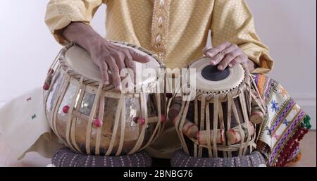 Man playing Indian drums. Stock Photo
