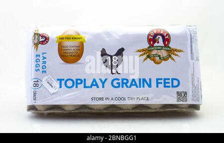 Alberton, South Africa - a box of 18 Toplay large chicken eggs isolated on a clear background image with copy space in horizontal format Stock Photo
