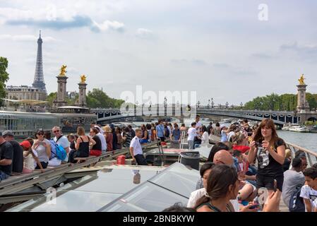 View of Pont Alexandre III (Alexandre the Third bridge) from a Bateaux Mouche on the river Seine on a sunny summer day. Paris, France. Stock Photo
