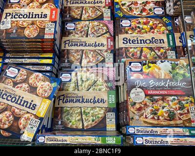 Tönisvorst, Germany - May 14. 2020: View on isolated Wagner stone oven pizza boxes in shelf of german supermarket Stock Photo