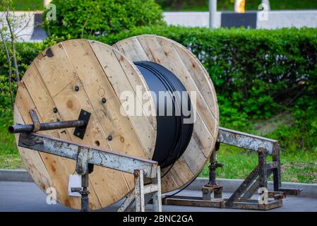 Cable drum, fiber-optic cable or wire and technology Stock Photo - Alamy