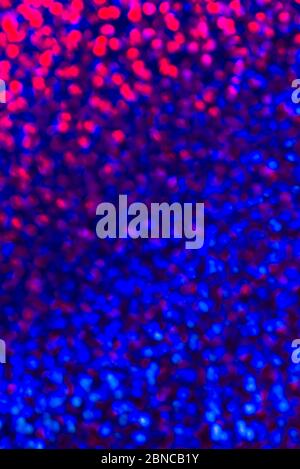 Bright Pink and blue neon Eco artificial leather texture close up. Top view. Copy space. Modern leather texture for background with visible details. Stock Photo