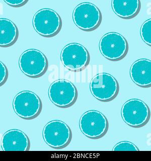 Seamless pattern citrus fruit orange lemon lying on blue surface. Colorful fresh citrus slice wallpaper. Creative vivid vibrant color, summer friuts c Stock Photo