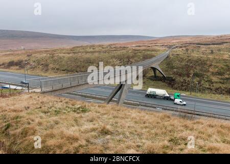 The Pennine Way footbridge crossing the M62 motorway in West Yorkshire Stock Photo