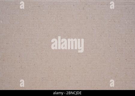 Light Brown Cardboard Texture for Design. Brown color paper shown grain details on it surface. Brown parchment surface, Old paper backdrop Stock Photo