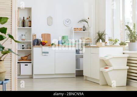Image of modern kitchen with white furniture at house Stock Photo