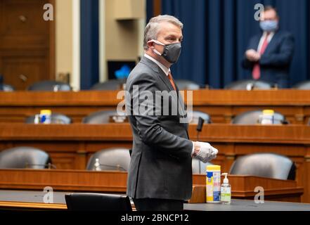 Washington DC, USA. 14th May 2020. Dr. Richard Bright, former director of the Biomedical Advanced Research and Development Authority, arrives to testify before the House Energy and Commerce Subcommittee on Health hearing to discuss protecting scientific integrity in response to the coronavirus outbreak on Capitol Hill in Washington, DC on Thursday, May 14, 2020. Bright, vaccine expert turned whistleblower, alleges that he was removed from his position by Trump Administration officials for refusing to back unproven coronavirus treatments. Credit: UPI/Alamy Live News Stock Photo
