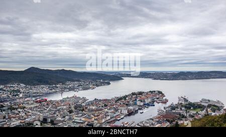 Bergen and Northern sea panoramic aerial view from Floyen attraction hiking area on cloudy grey cold day. Bergen, Norway Stock Photo