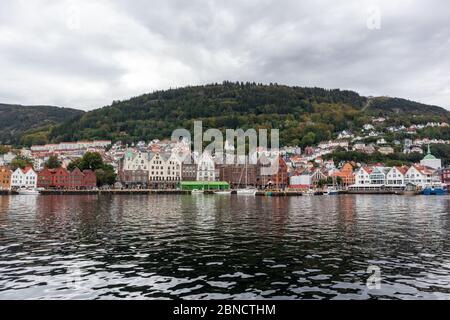 Sea water view on historical buildings in Hanseviertel Bryggen wharf in Bergen, Norway. UNESCO World Heritage Site Stock Photo