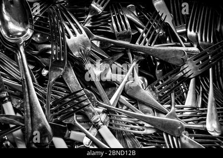Drawer full of silver cutlery in black and white Stock Photo