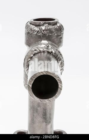 Pipe sections with amateurishly bad welds. Stock Photo