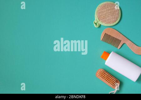 Cosmetic products on blue yellow background. Natural beauty products for branding mock-up concept. Top view, copy space. Stock Photo