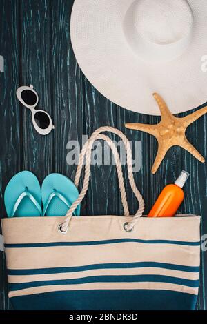 Starfish near flip flops and sunglasses on beach Stock Photo - Alamy