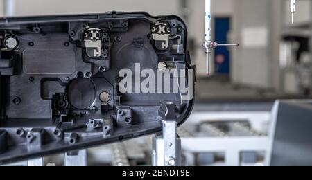 accurate 3d measurement of plastic castings on a modern machine for the automotive industry, computer controlled, program industry 4.0 Stock Photo