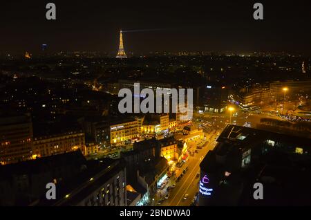 Paris, France, March, 8th, 2014 - Night view of Paris landscape with Eiffel Tower in the background. Stock Photo