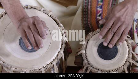 Man playing Indian drums. Stock Photo