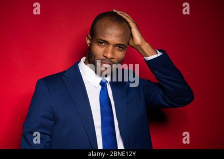 Close-up portrait of his he nice attractive content classy guy partner leader agent broker wearing tux tuxedo touching shaved head hairstyle isolated Stock Photo