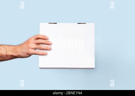 Safe delivery with care for yourself and others. Front view to delivery box. Stock Photo