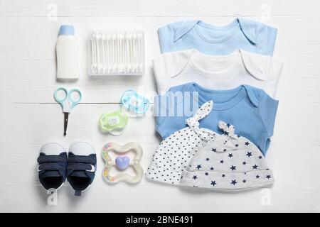 Flat lay composition with baby food and accessories on white background  Stock Photo - Alamy