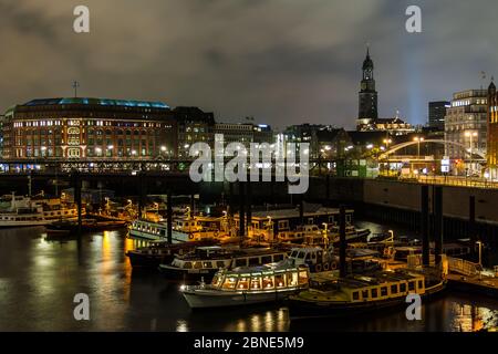 Barges in the port of Hamburg at night Stock Photo