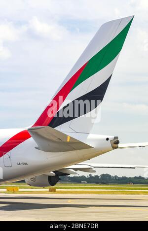 MILAN, ITALY - JUNE 2019: Airbus A380 Tail fin of an Emirates Airbus A380-800 jet taxiing for take off from Milan Malpensa airport. Stock Photo